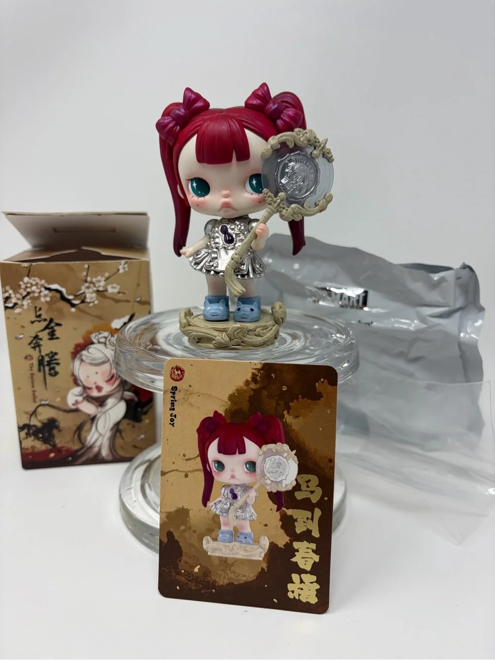 Red-Haired Collectible Action Figure with Silver Mirror